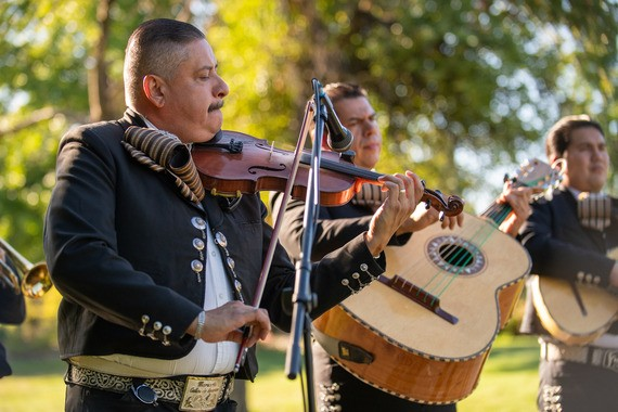 mariachi band performs
